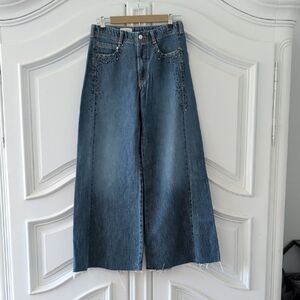 Anthropologie Wide-Leg Flare Jeans in Medium Wash Blue